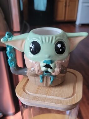 Star Wars Grogu Holding A Frog Ceramic Mug - Mint Green & Brown